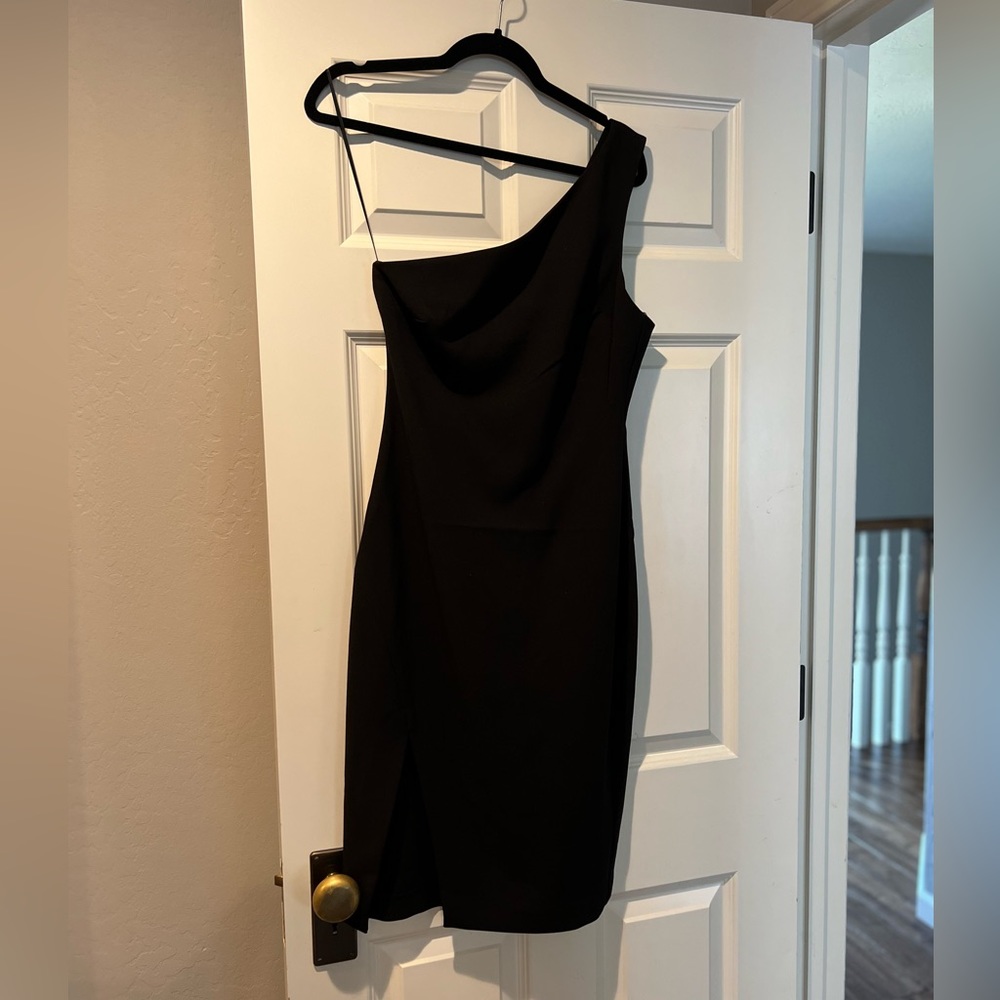 LBD! Likely brand black one shoulder dress. Never worn, with tags.